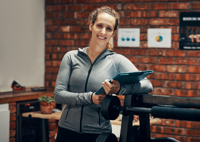 smiling gym owner